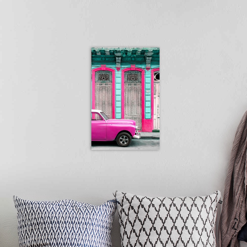 A bohemian room featuring Photograph of a bright pink vintage car parked outside of a beautiful old building with a bright ...