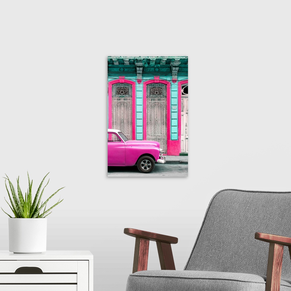 A modern room featuring Photograph of a bright pink vintage car parked outside of a beautiful old building with a bright ...