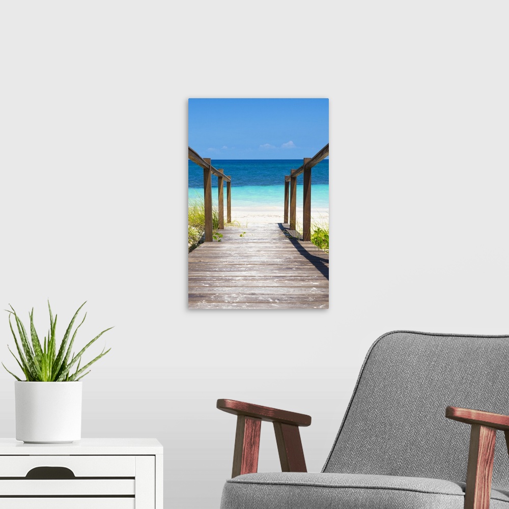 A modern room featuring Photograph of a wooden walkway leading onto a beach in Cuba with crystal blue waters.