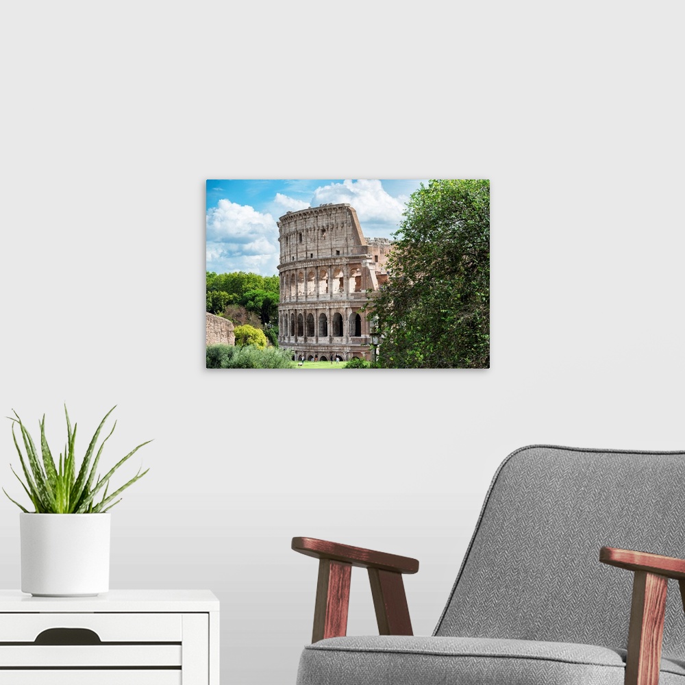 A modern room featuring It's a view of the Colosseum in the centre of the city of Rome, Italy.