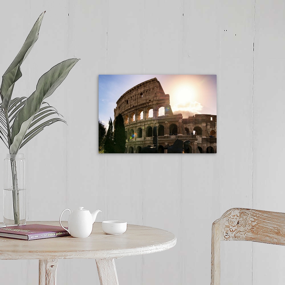 A farmhouse room featuring It's a view of the Colosseum at sunset in the centre of the city of Rome, Italy.