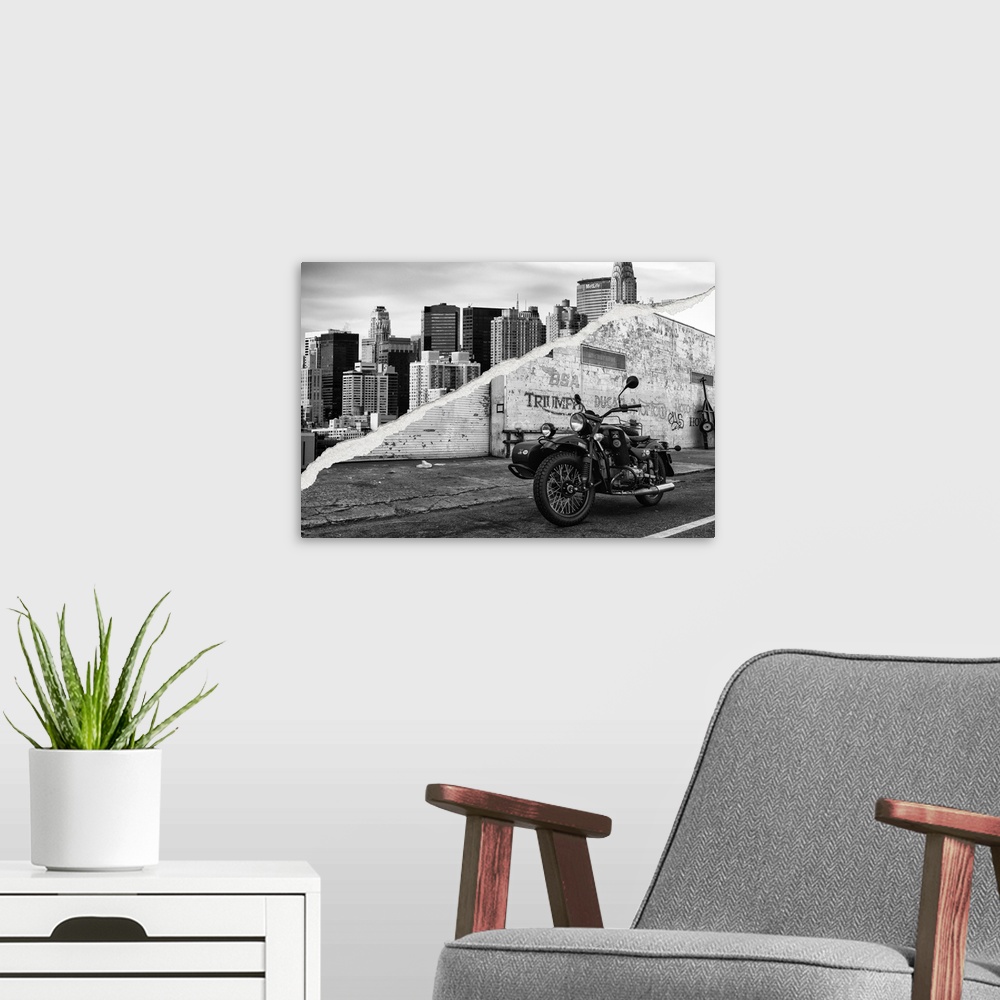 A modern room featuring Two torn photographs of New York city landmark sites put together to make one image.