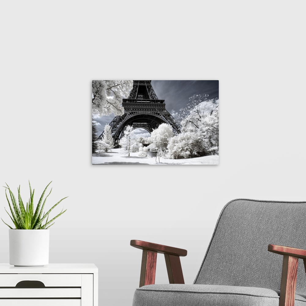 A modern room featuring A view of the Eiffel Tower in Paris, made in infrared mode in summer. The vegetation is white and...
