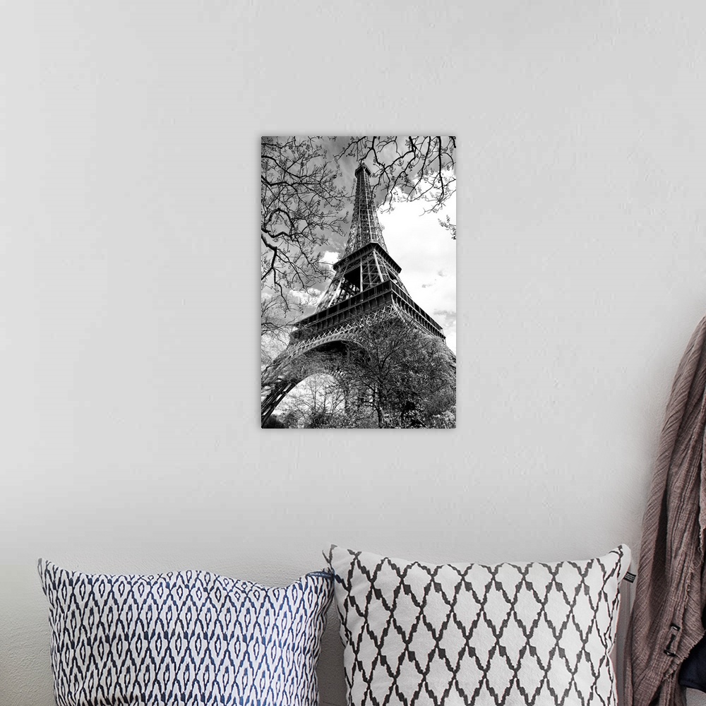 A bohemian room featuring Fine art photograph of the Eiffel Tower in France, looking up from the ground.