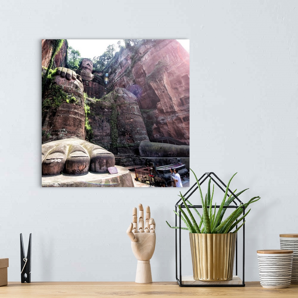 A bohemian room featuring Giant Buddha of Leshan, China 10MKm2 Collection.