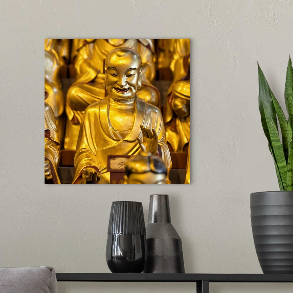 A modern room featuring Gold Buddhist Statue in Longhua Temple, China 10MKm2 Collection.