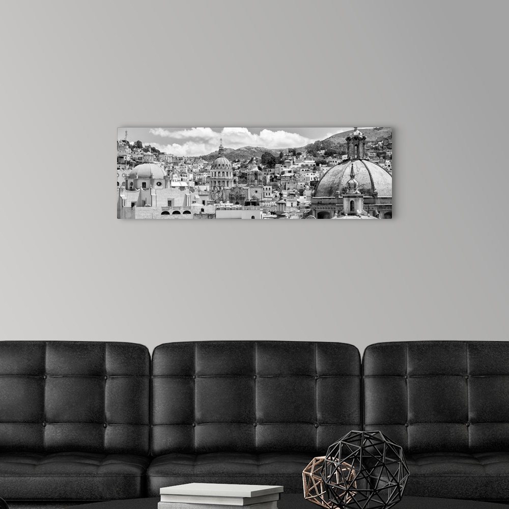 A modern room featuring Black and white panoramic photograph of a cityscape in Guanajuato, Mexico. From the Viva Mexico P...