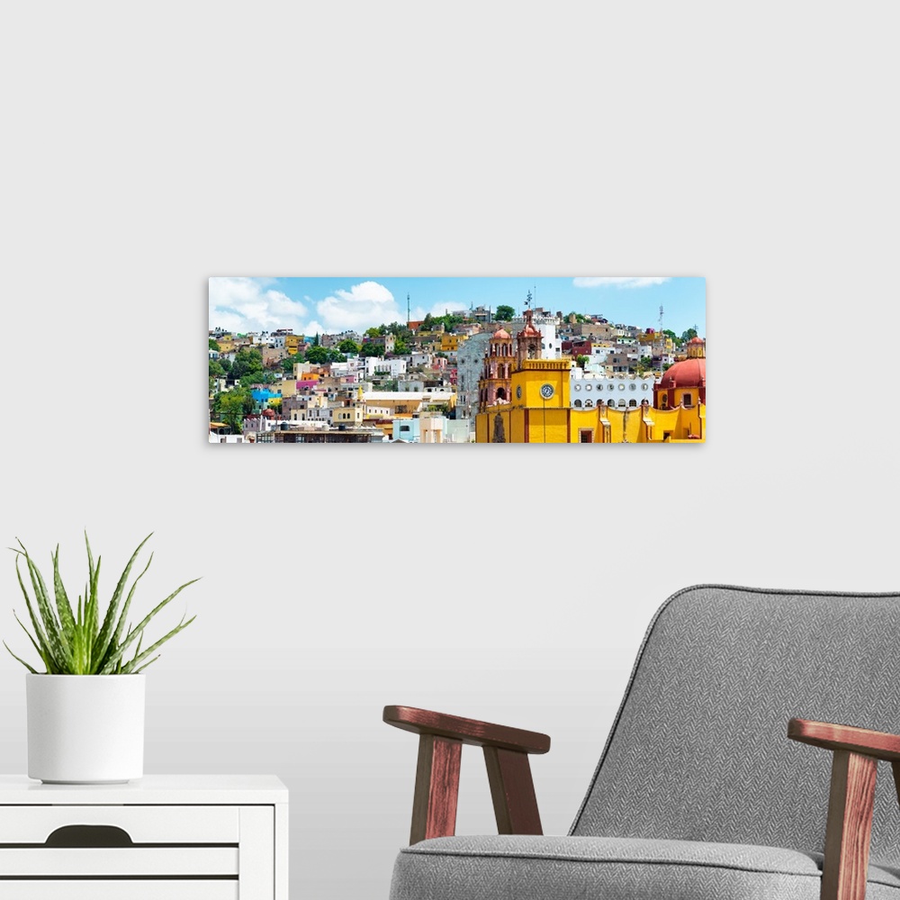 A modern room featuring Colorful panoramic photograph of a cityscape in Guanajuato, Mexico. From the Viva Mexico Panorami...