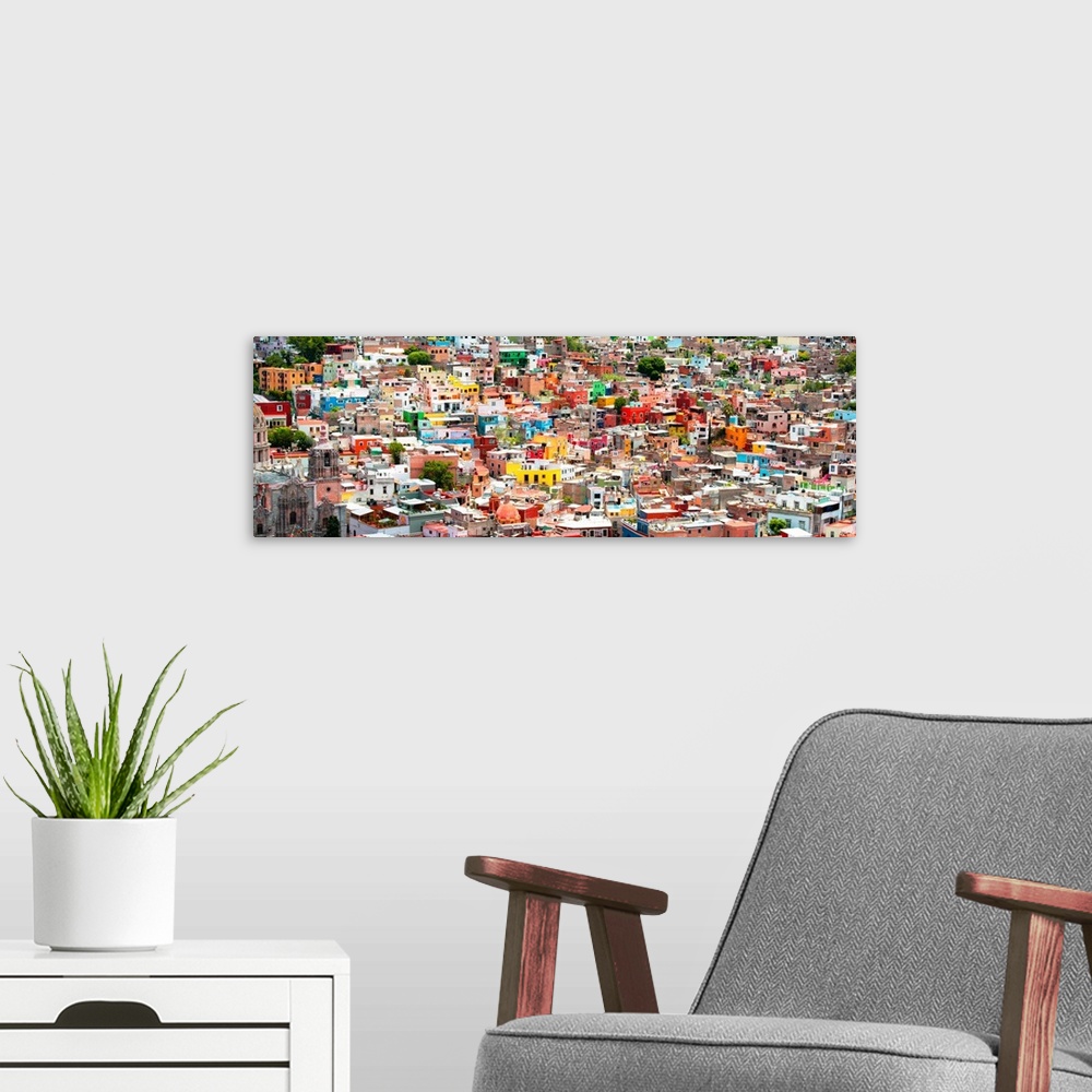 A modern room featuring Colorful panoramic cityscape photograph of Guanajuato, Mexico. From the Viva Mexico Panoramic Col...