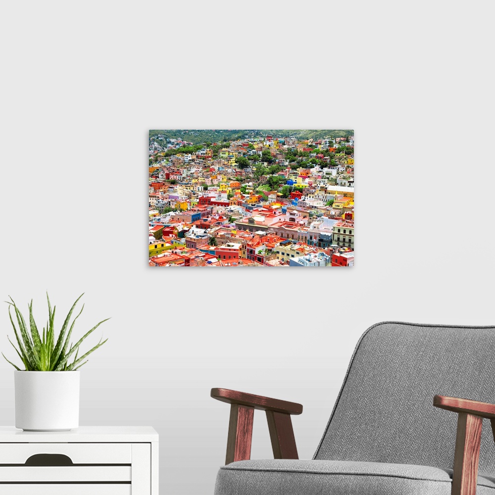 A modern room featuring Aerial photograph of the city of Guanajuato, Mexico, with colorful buildings. From the Viva Mexic...