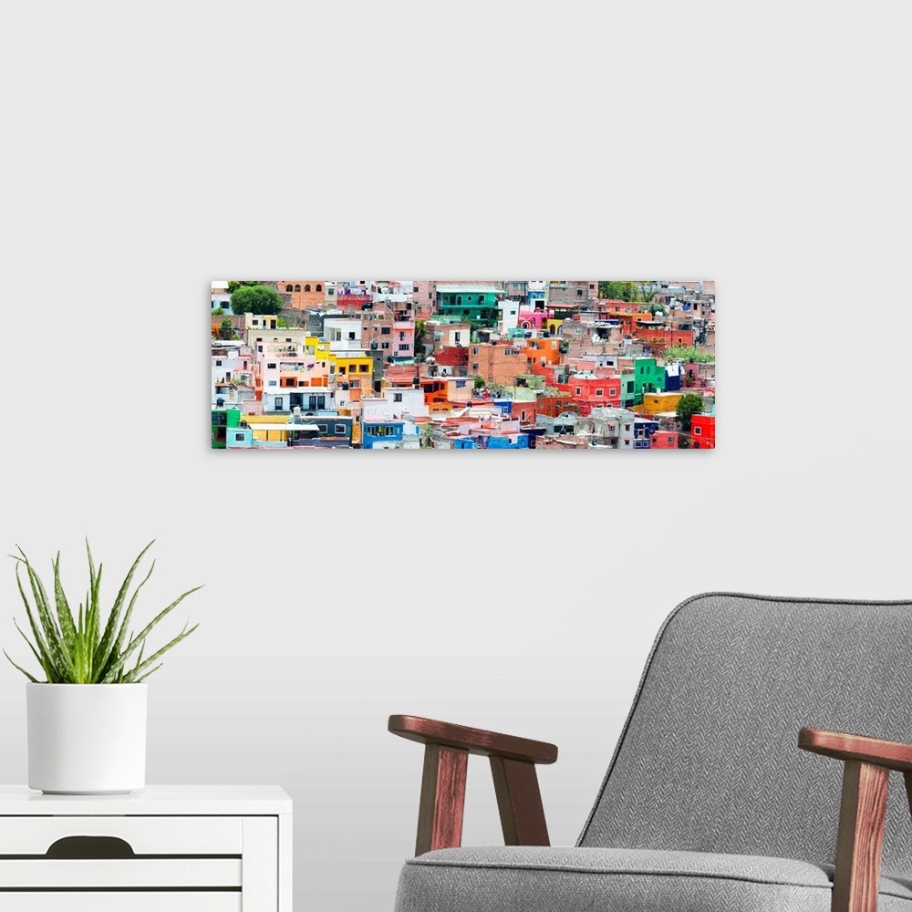 A modern room featuring Colorful panoramic cityscape photograph of Guanajuato, Mexico. From the Viva Mexico Panoramic Col...