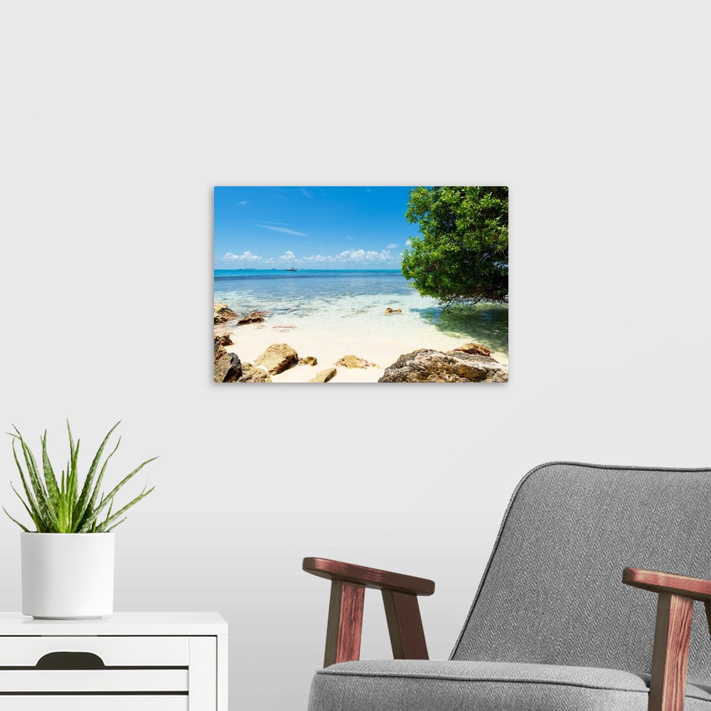 A modern room featuring Photograph of Isla Mujeres on the Caribbean coastline, Mexico, with a boat in the distance. From ...