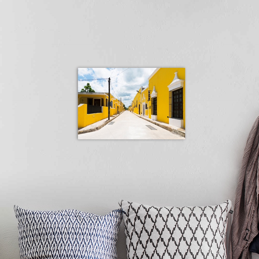 A bohemian room featuring Street view photograph highlighting the yellow buildings in Izamal, Yucat?n, Mexico. From the Viv...