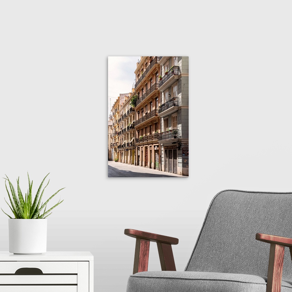 A modern room featuring These are old facades of buildings in Valencia, Spain.