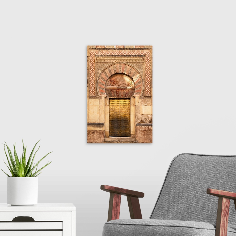 A modern room featuring It's a golden door of the famous Mosque-Cathedral of Cordoba in Spain.