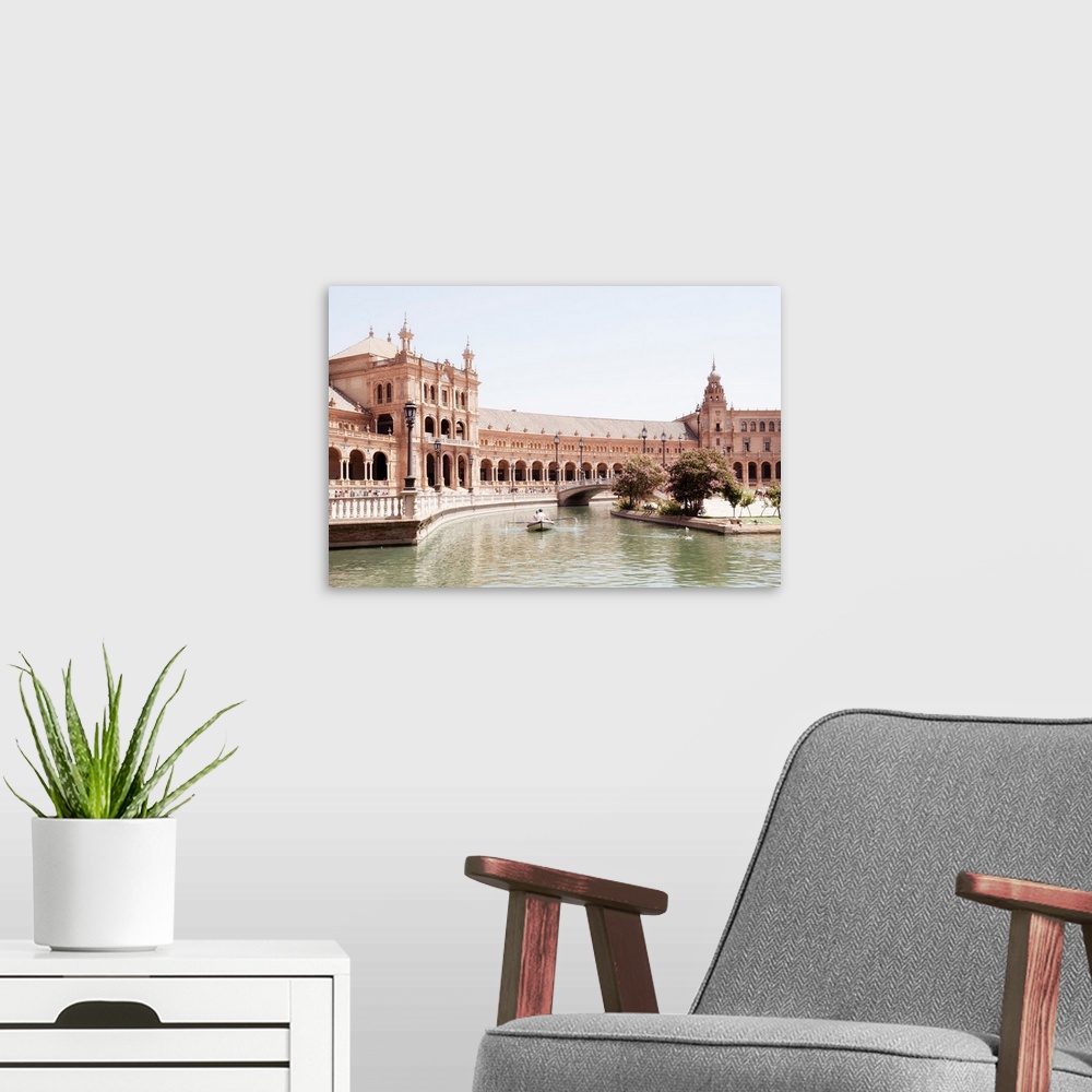 A modern room featuring It's the beautiful Plaza de Espana (Spain Square) with the Palace and the bridge on the canal in ...