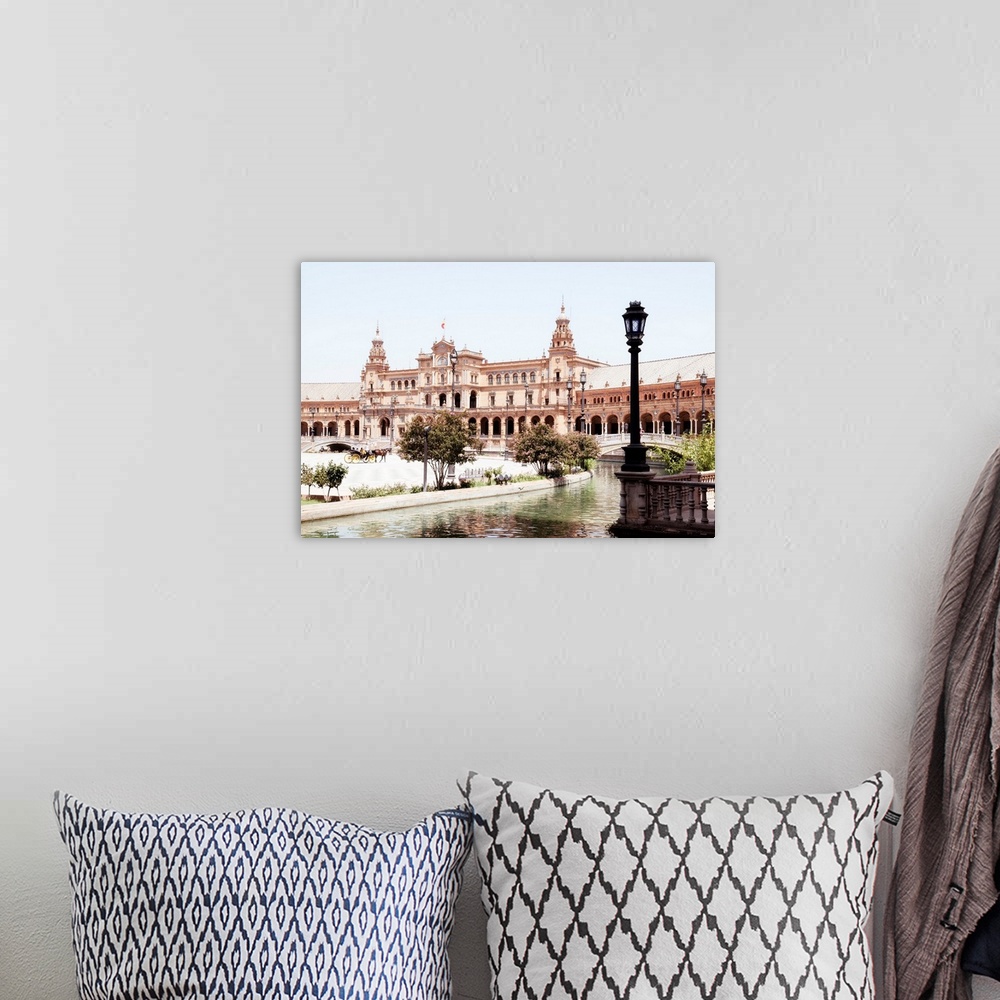 A bohemian room featuring It's the beautiful Plaza de Espana (Spain Square) with the Palace and the bridge on the canal in ...