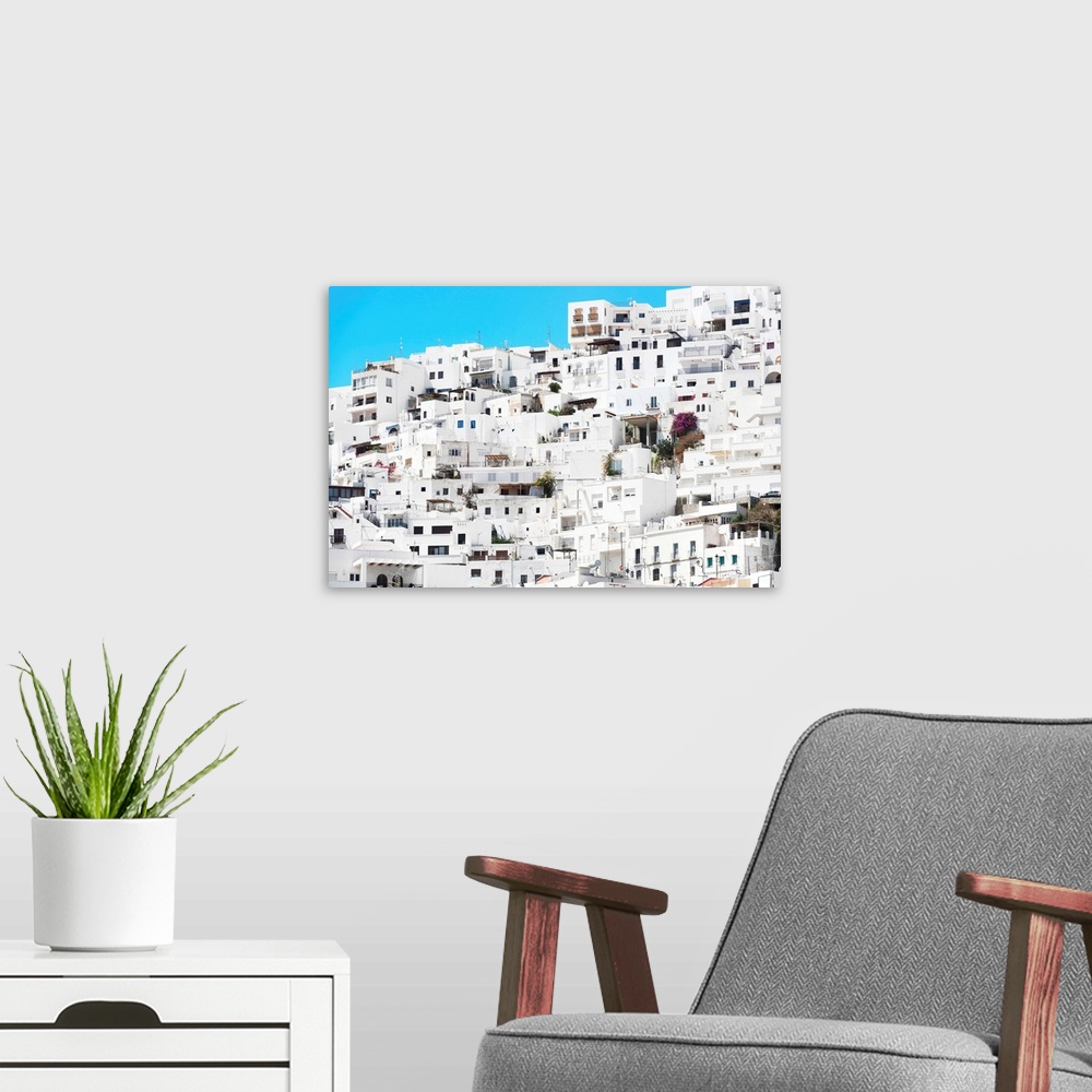 A modern room featuring It's the white city of Mojacar in Spain, with all the white buildings.