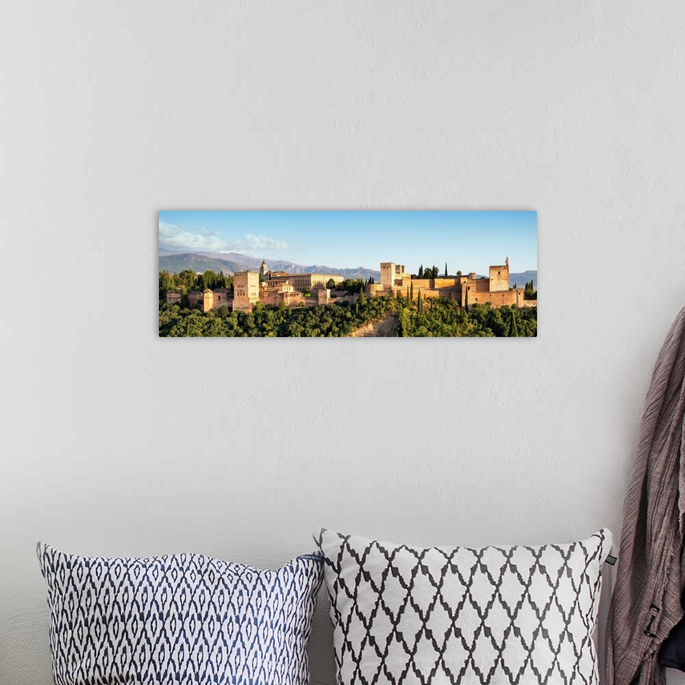 A bohemian room featuring It's a beautiful view of the Alhambra at sunset in Granada, Spain.