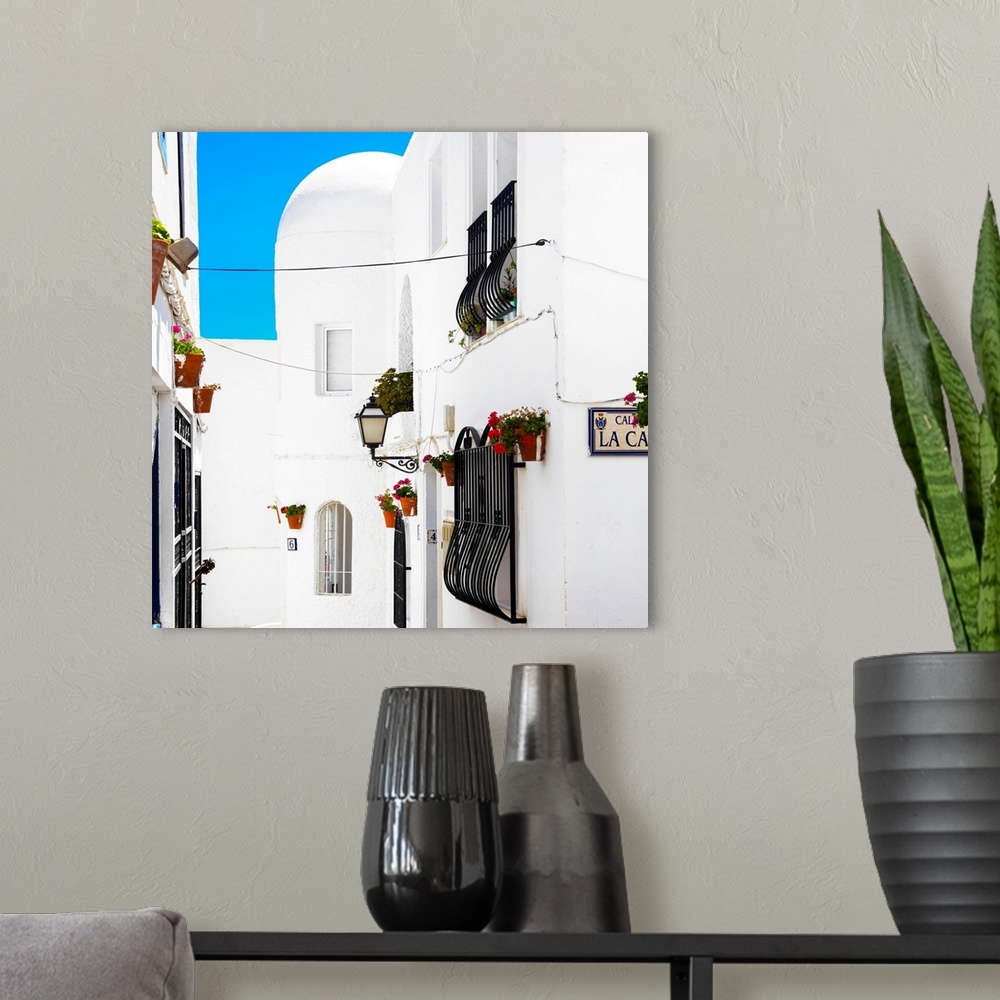 A modern room featuring It's a street with white facades in Mojacar, Spain.