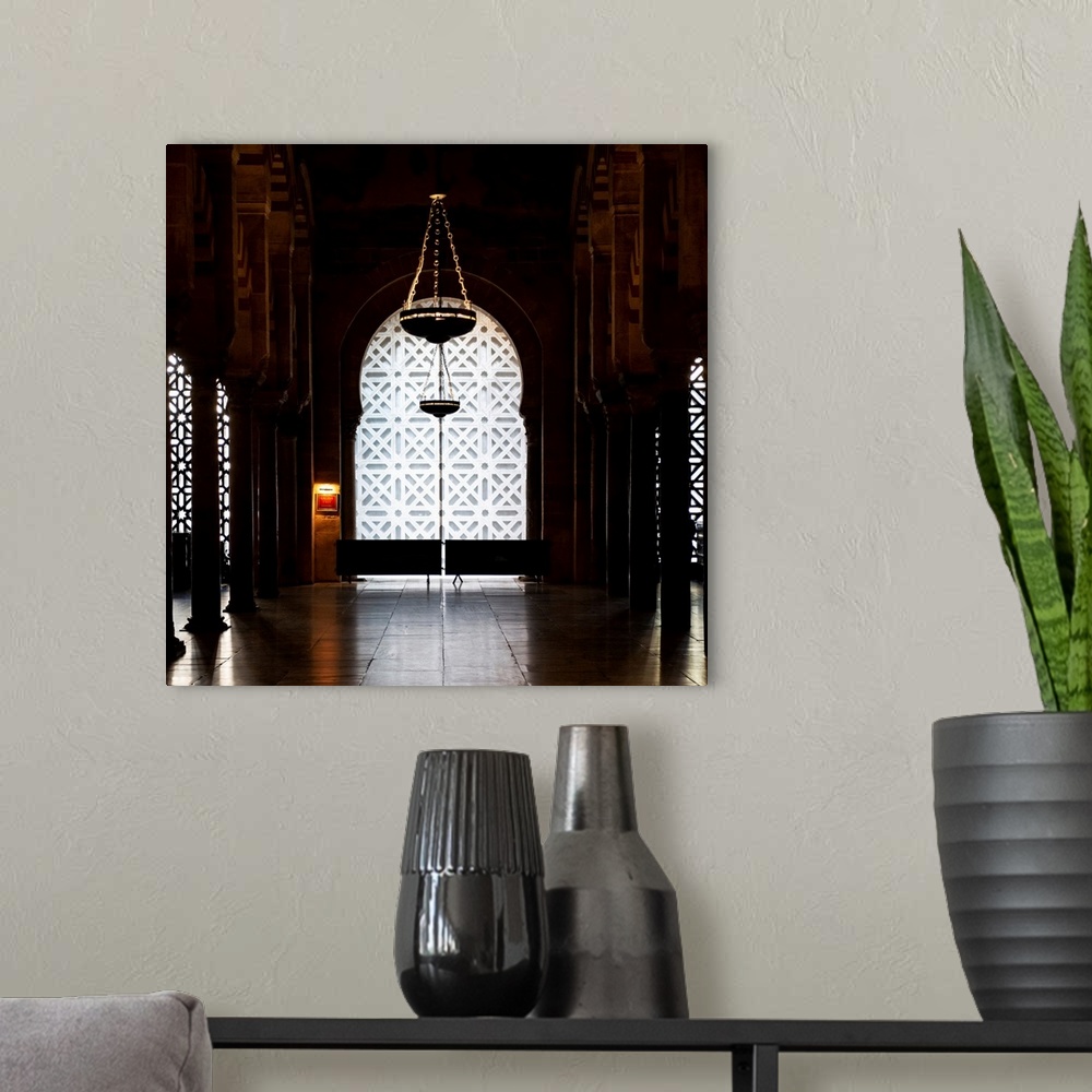 A modern room featuring It's a window overlooking the interior of the Mosque-Cathedral of Cordoba in Spain.