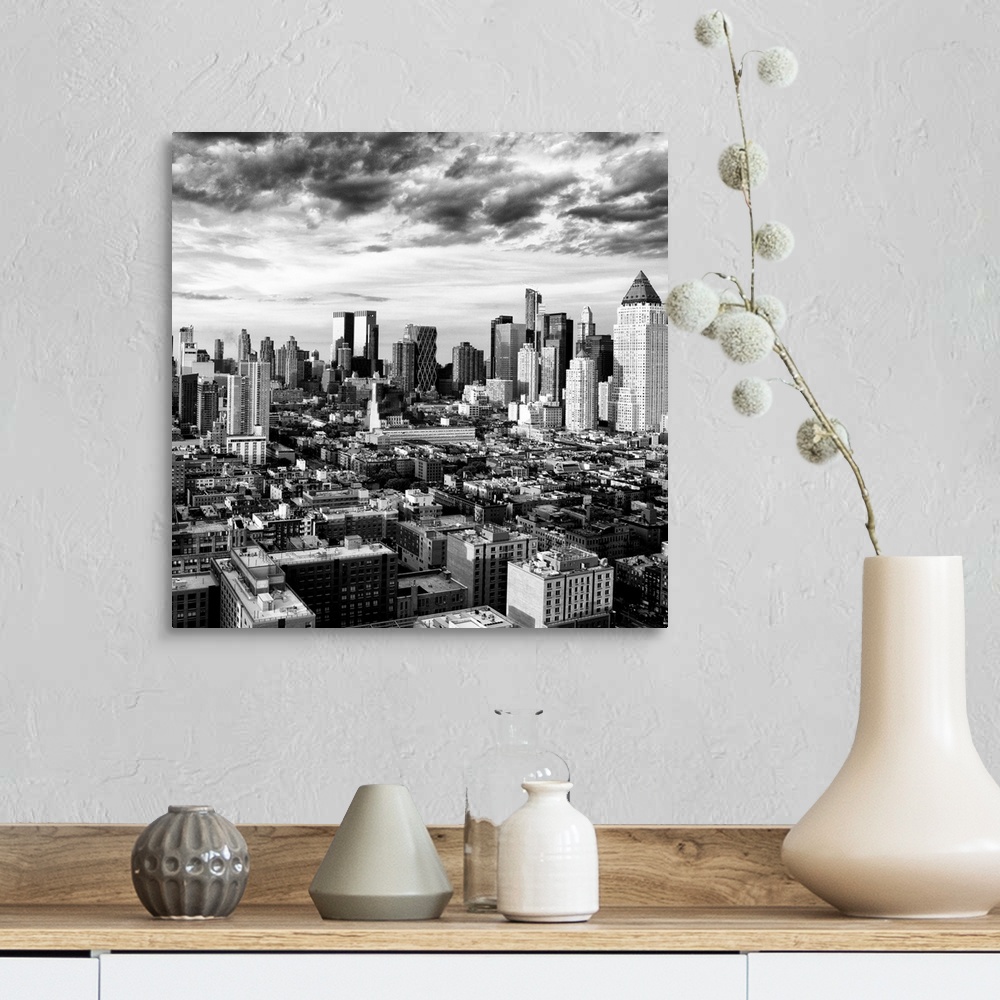 A farmhouse room featuring A black and white photo of the New York City skyline under dramatic clouds.