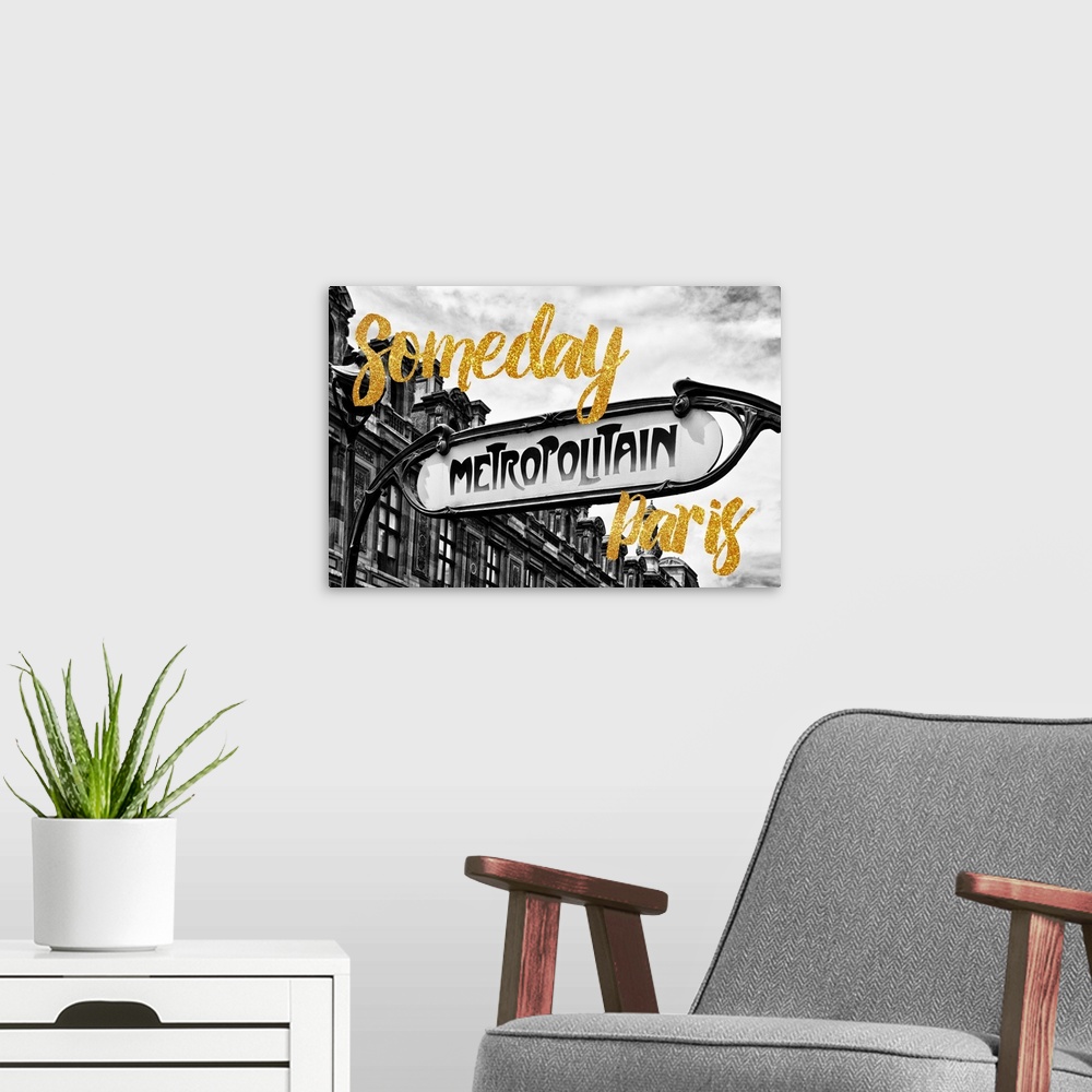 A modern room featuring Black and white photograph of a "Metropolitan" street sign in Paris, France with the phrase "Some...