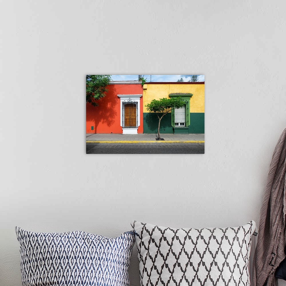 A bohemian room featuring Photograph of colorful facades in Mexico in red, yellow, and green. From the Viva Mexico Collection.