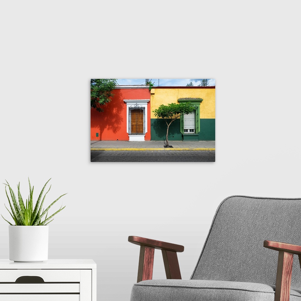 A modern room featuring Photograph of colorful facades in Mexico in red, yellow, and green. From the Viva Mexico Collection.