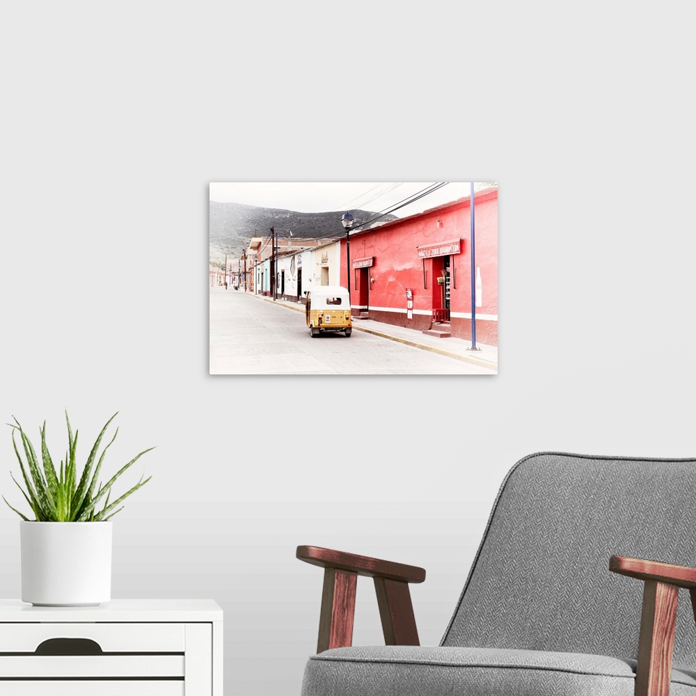 A modern room featuring Washed out photograph of a Mexican street scene with a yellow Tuk Tuk on the road. From the Viva ...