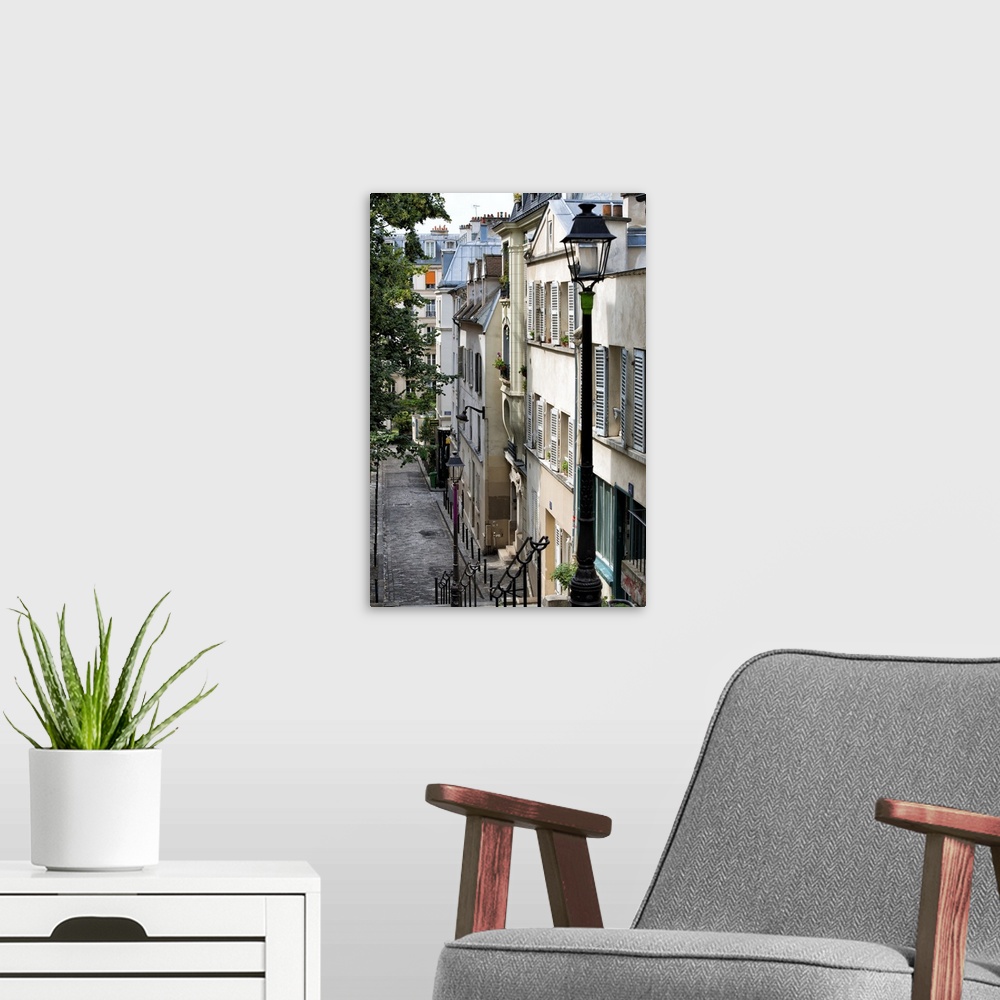 A modern room featuring A photograph of a Parisian architecture in Montmarte.
