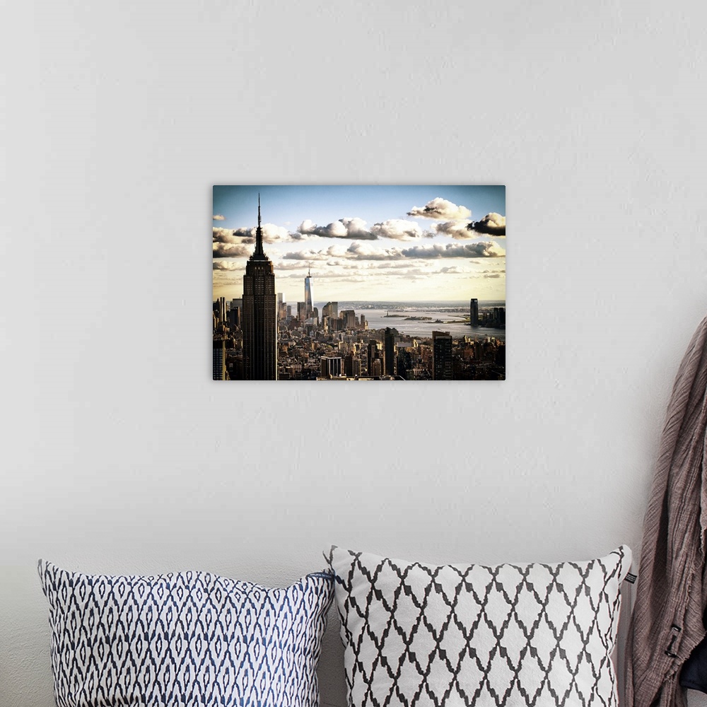 A bohemian room featuring Fine art photograph of the New York City vista with the Empire State Building in the foreground.
