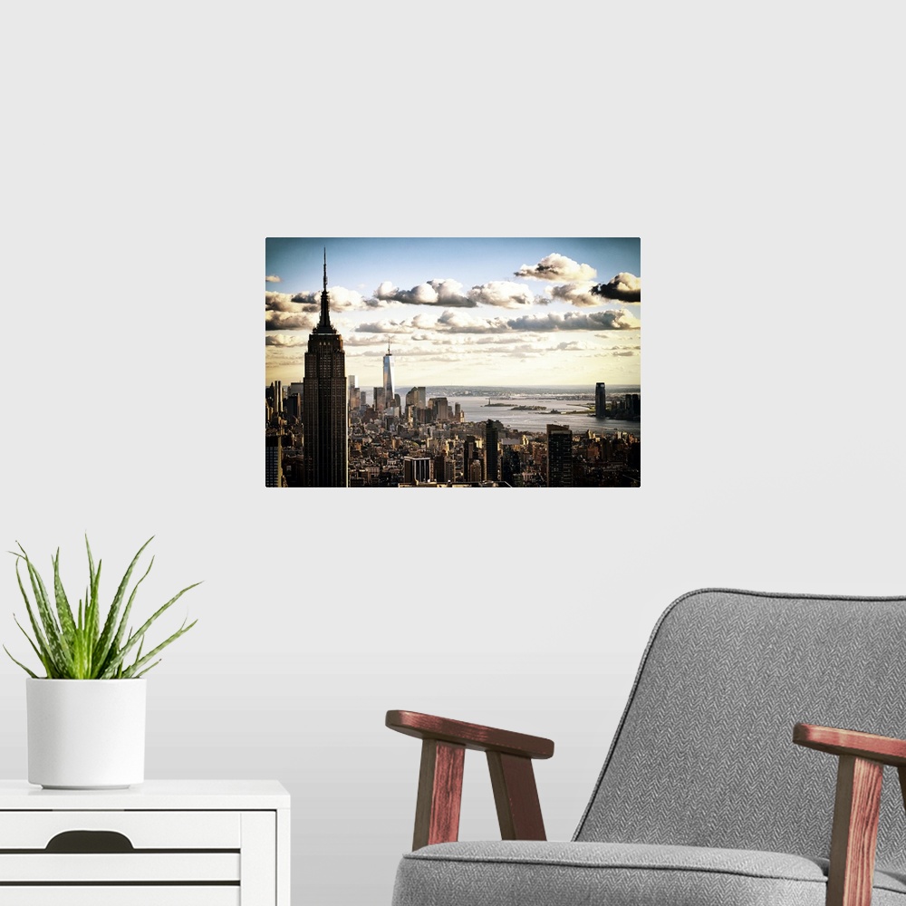 A modern room featuring Fine art photograph of the New York City vista with the Empire State Building in the foreground.
