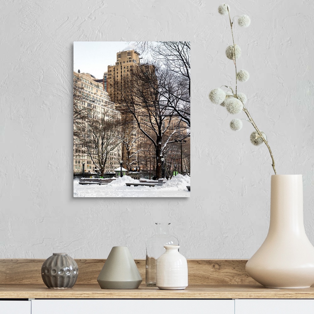 A farmhouse room featuring A photograph looking at surrounding buildings around Central Park in winter, in NYC.