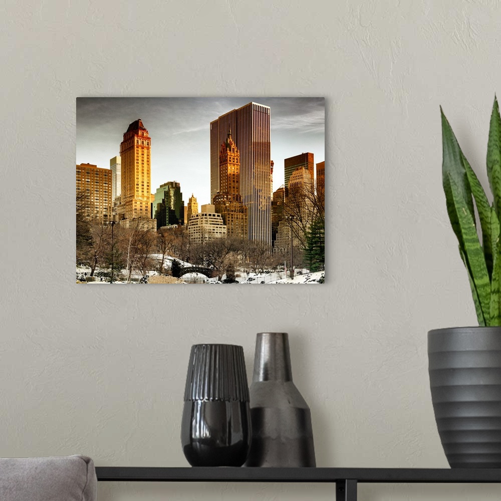 A modern room featuring A photograph of New York city at sunset from Central Park.