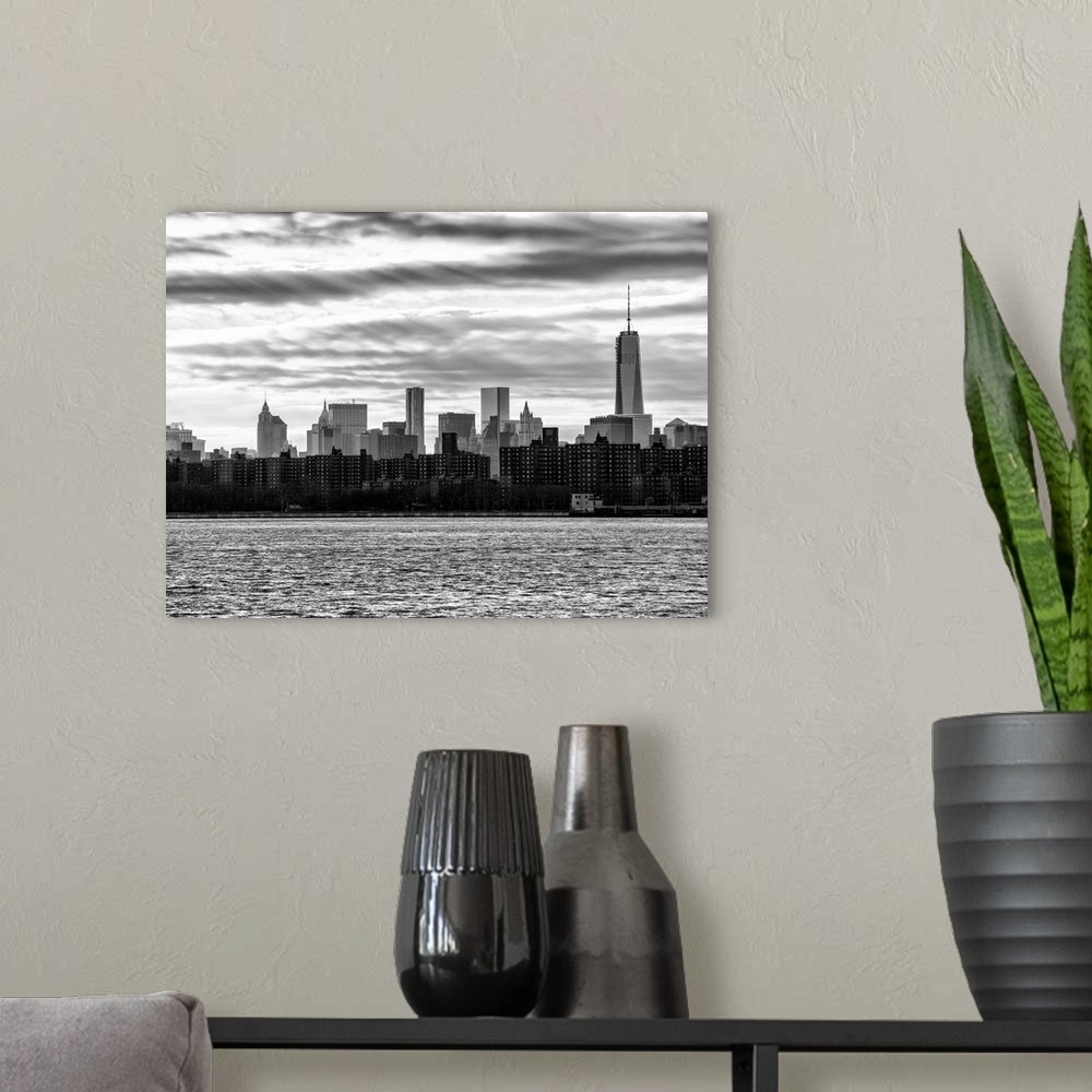 A modern room featuring A black and white photograph of the New York city skyline.
