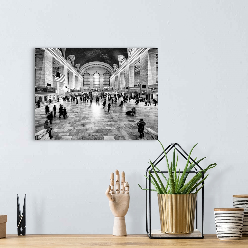 A bohemian room featuring A photograph of New York city's Grand Central Station.