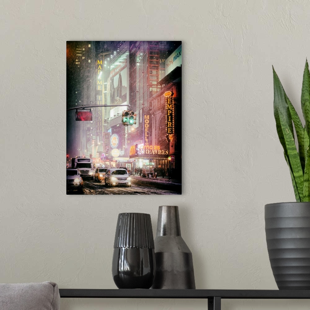 A modern room featuring A photograph of New York city at night, with neon light shining bright through the falling snow.