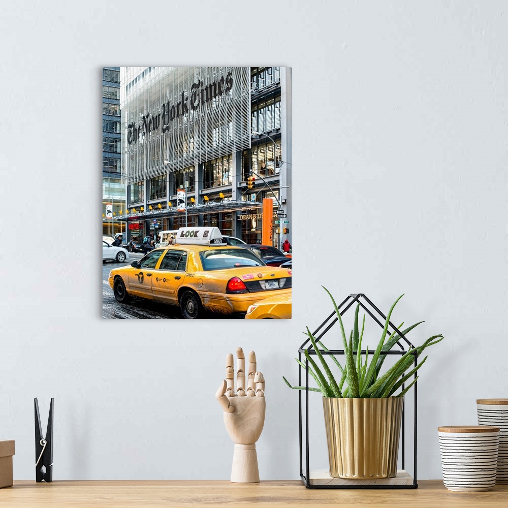 A bohemian room featuring A photograph of NYC taxi's in front of the New York Times building.