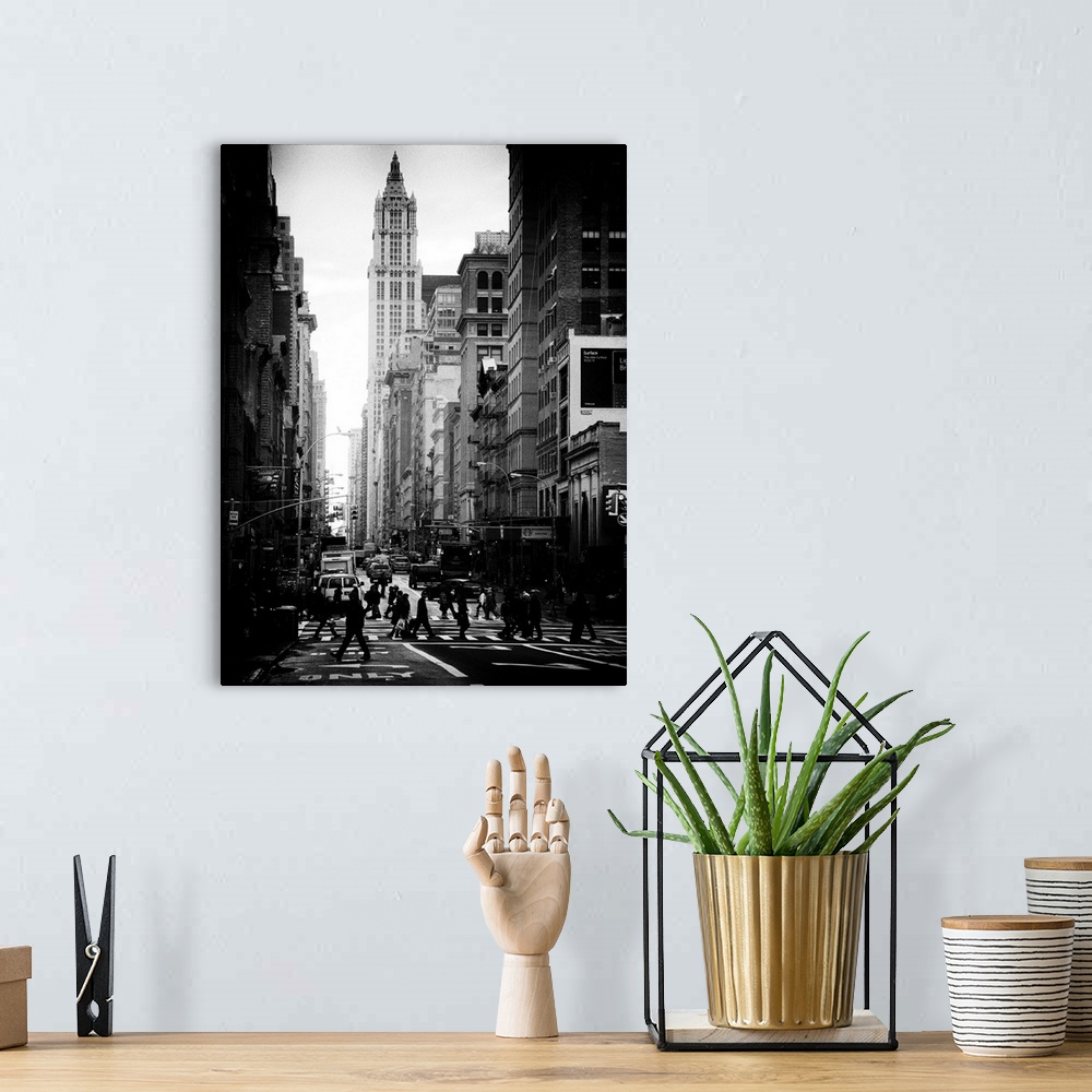 A bohemian room featuring A black and white photograph of urban life in New York city.