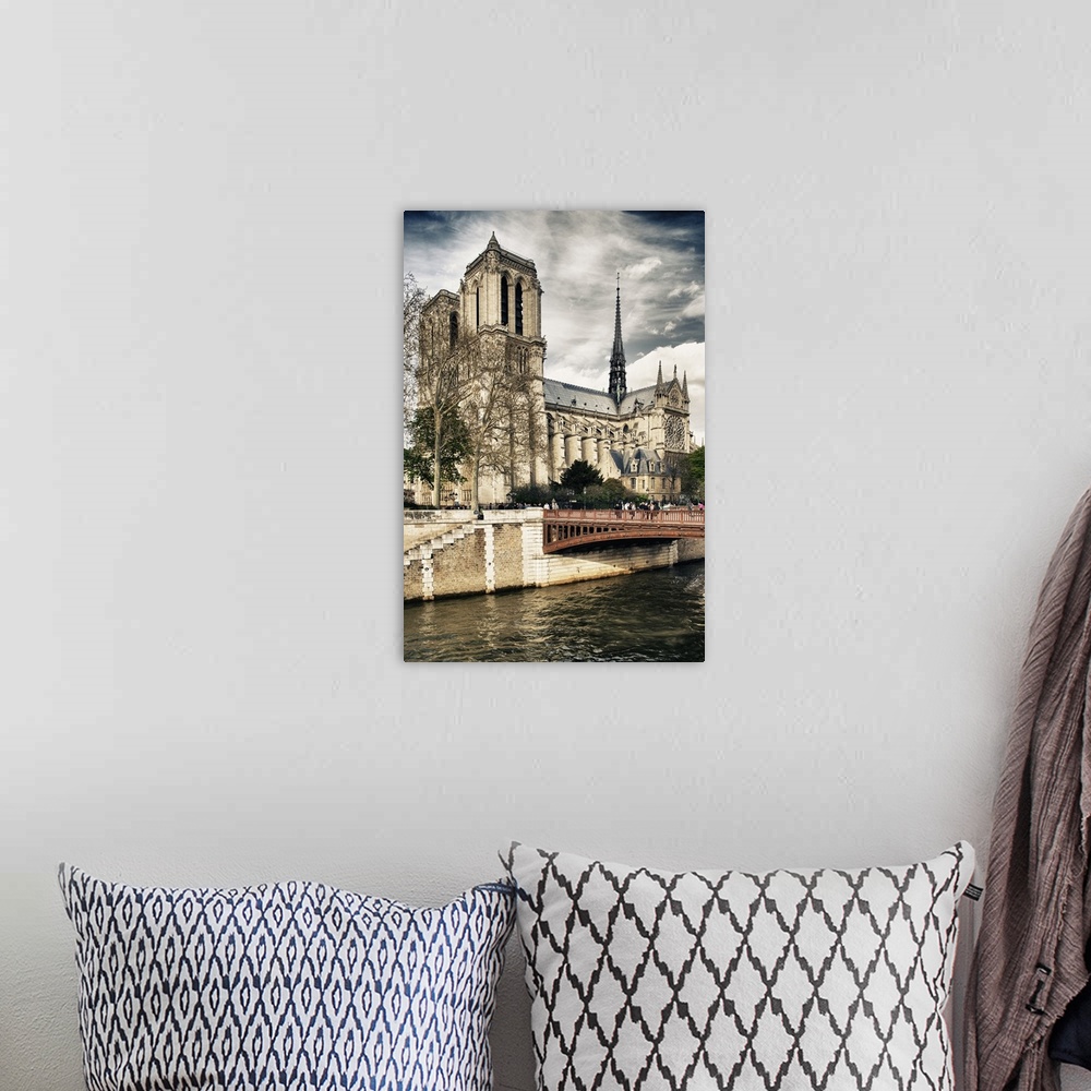 A bohemian room featuring View of the Notre Dame de Paris Cathedral from the Seine River.