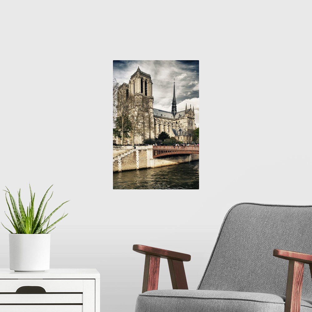 A modern room featuring View of the Notre Dame de Paris Cathedral from the Seine River.