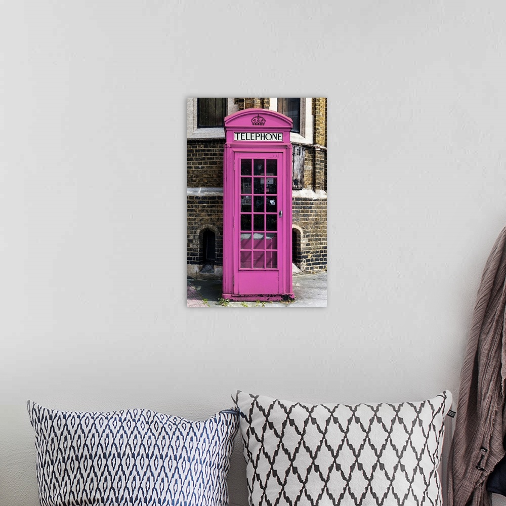 A bohemian room featuring Fine art photo of an iconic telephone booth, painted unusually pink, on a London street corner.