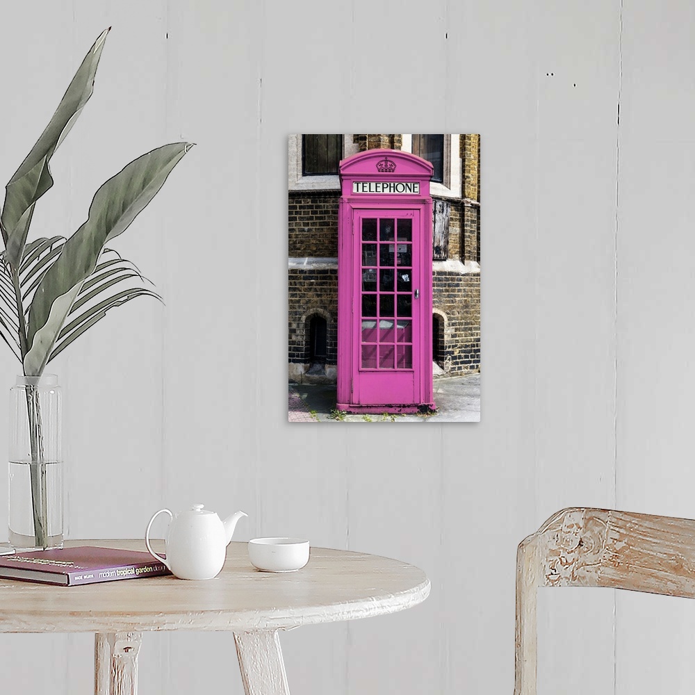 A farmhouse room featuring Fine art photo of an iconic telephone booth, painted unusually pink, on a London street corner.