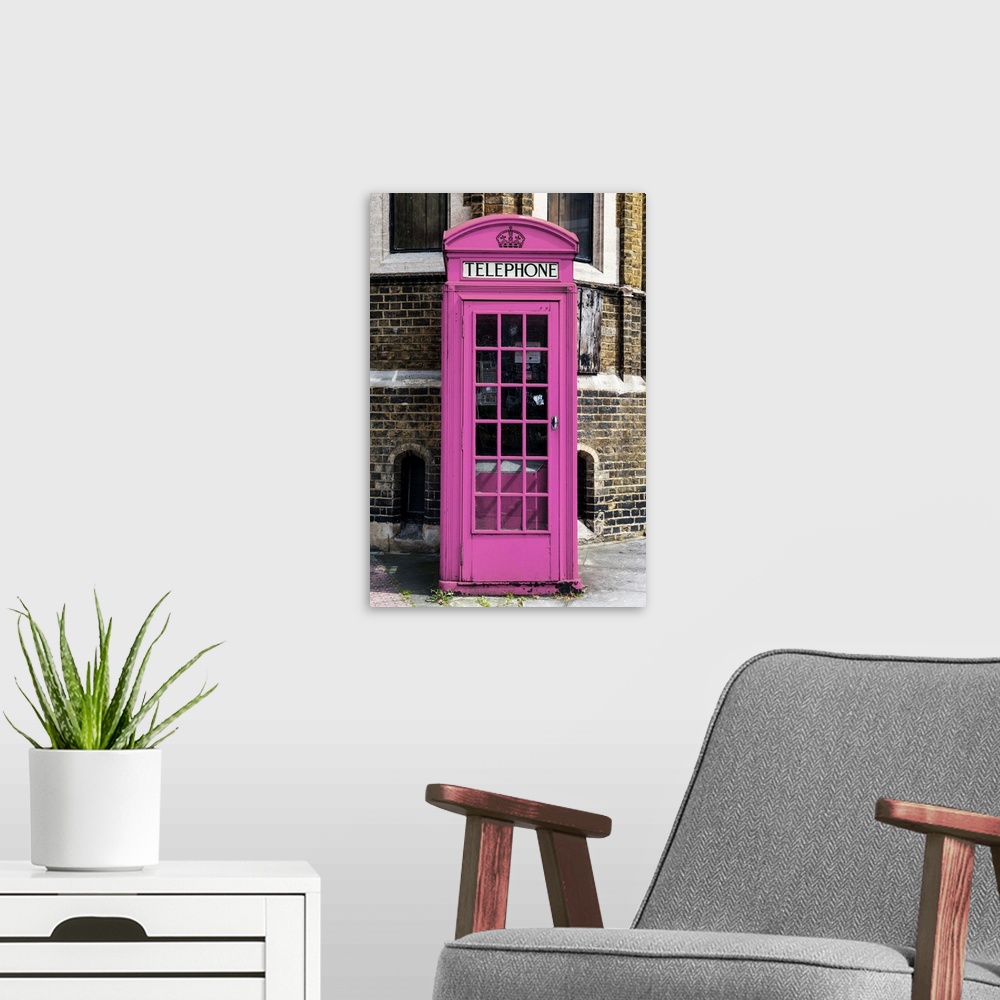 A modern room featuring Fine art photo of an iconic telephone booth, painted unusually pink, on a London street corner.