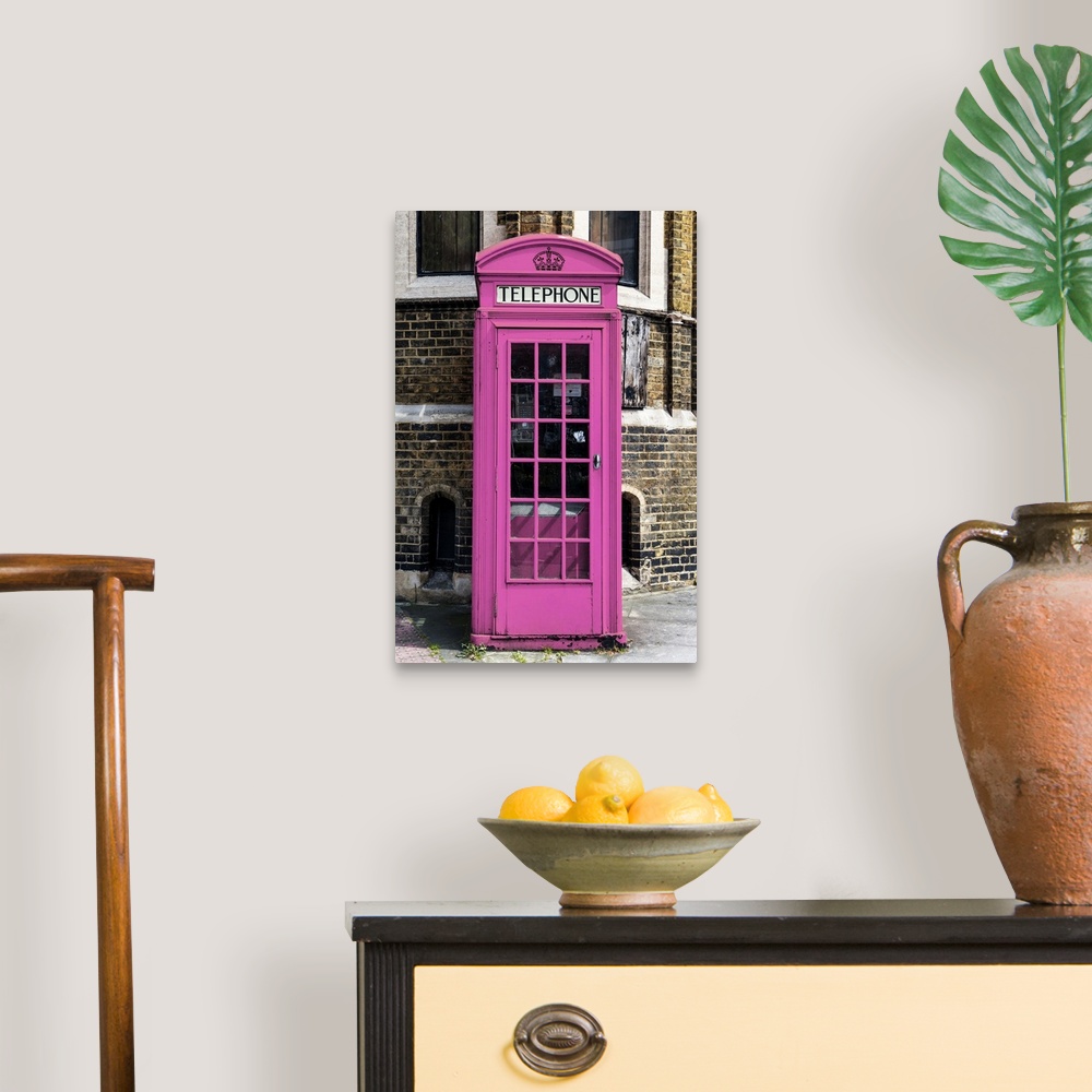A traditional room featuring Fine art photo of an iconic telephone booth, painted unusually pink, on a London street corner.