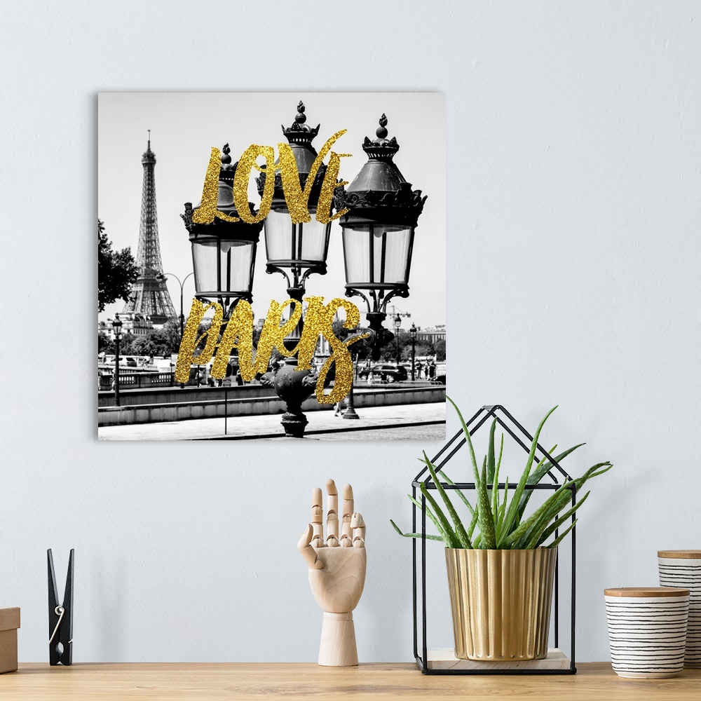 A bohemian room featuring Black and white photograph of a lamppost with the Eiffel Tower in the background and the phrase "...