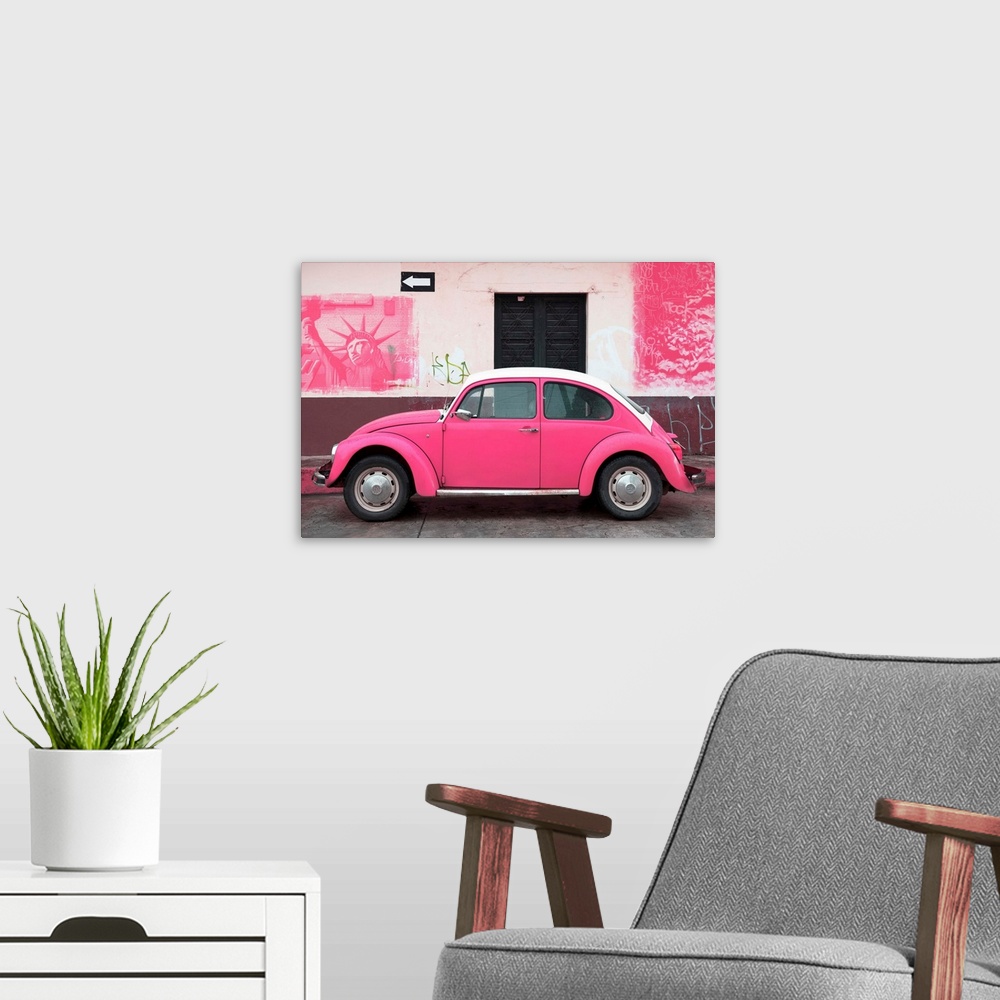 A modern room featuring Photograph of a pink Volkswagen Beetle parked in front of a wall covered in pink American graffit...