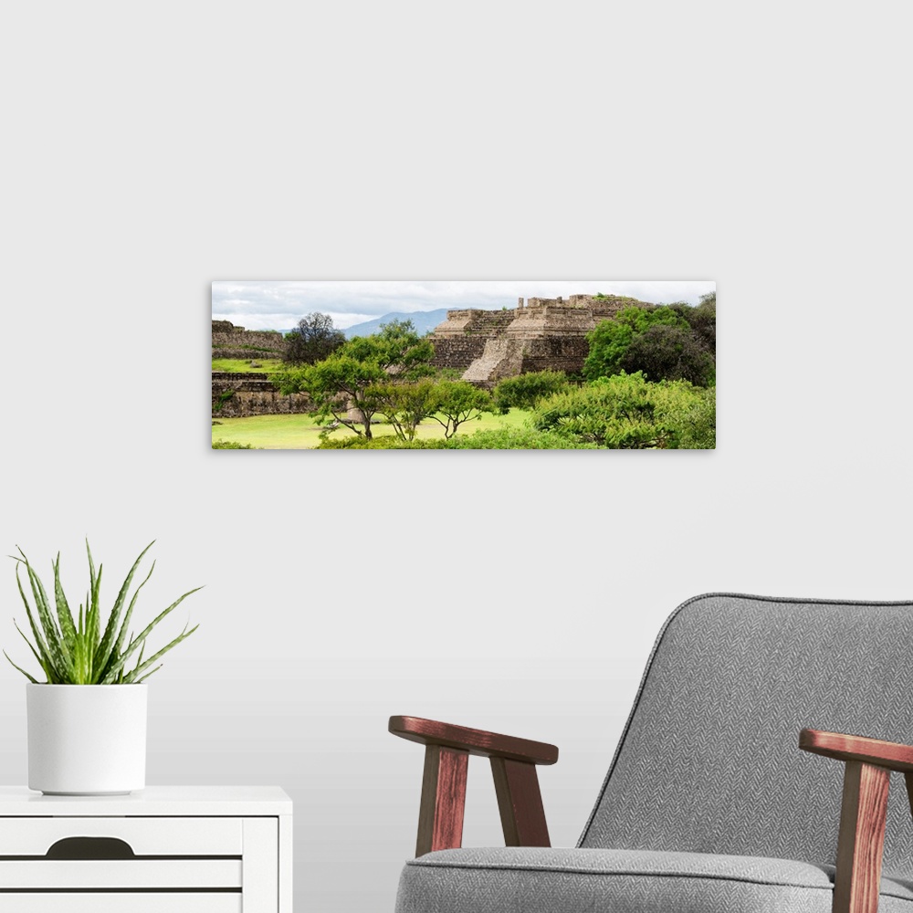 A modern room featuring Panoramic photograph of ancient pyramids at Monte Alban archaeological site in Oaxaca, Mexico. Fr...