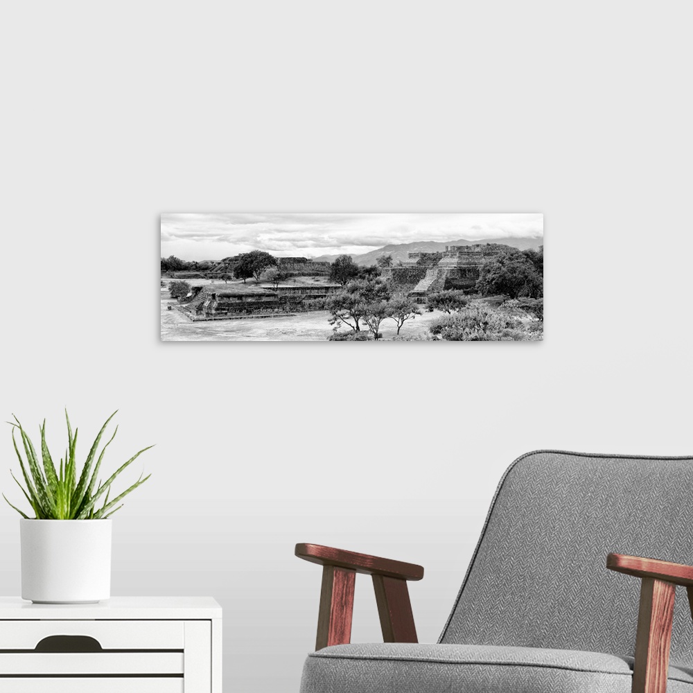 A modern room featuring Black and white panoramic photograph of the pyramid of Monte Alban in Oaxaca, Mexico. From the Vi...